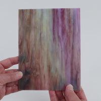 Video of the Hyacinth glass plate in translucent purple, 15x19cm, held up and tilted to show its pattern and transparency